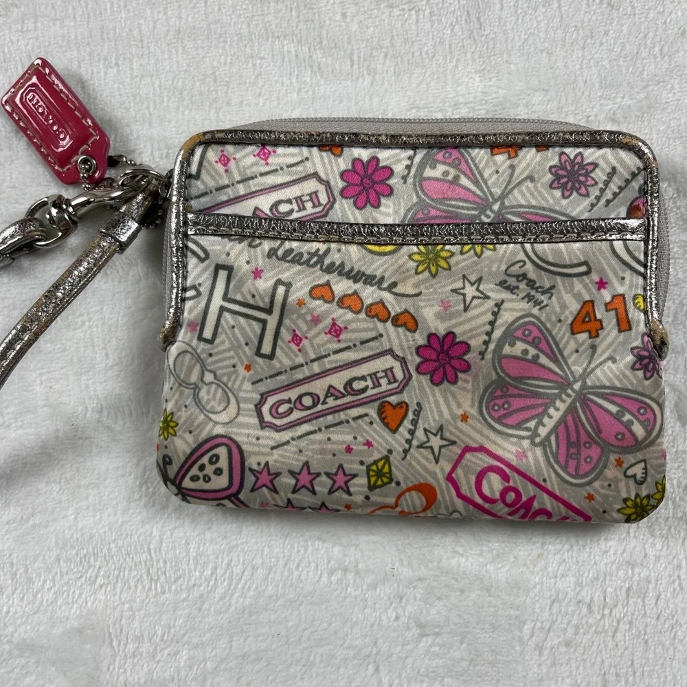 Coach card wristlet featuring